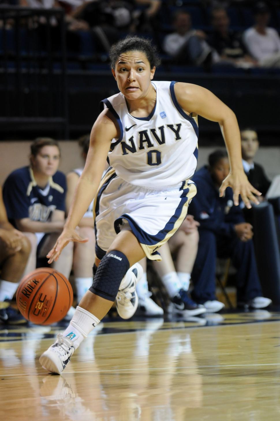 Free Image of Woman Dribbling Basketball on Court 