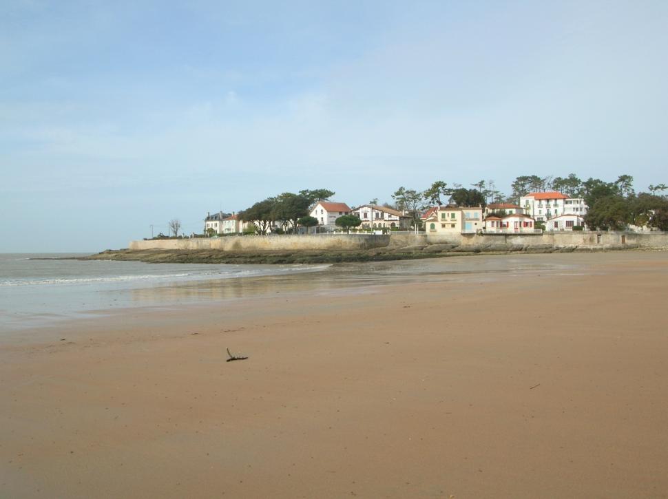 Free Image of Houses on Sandy Beach 