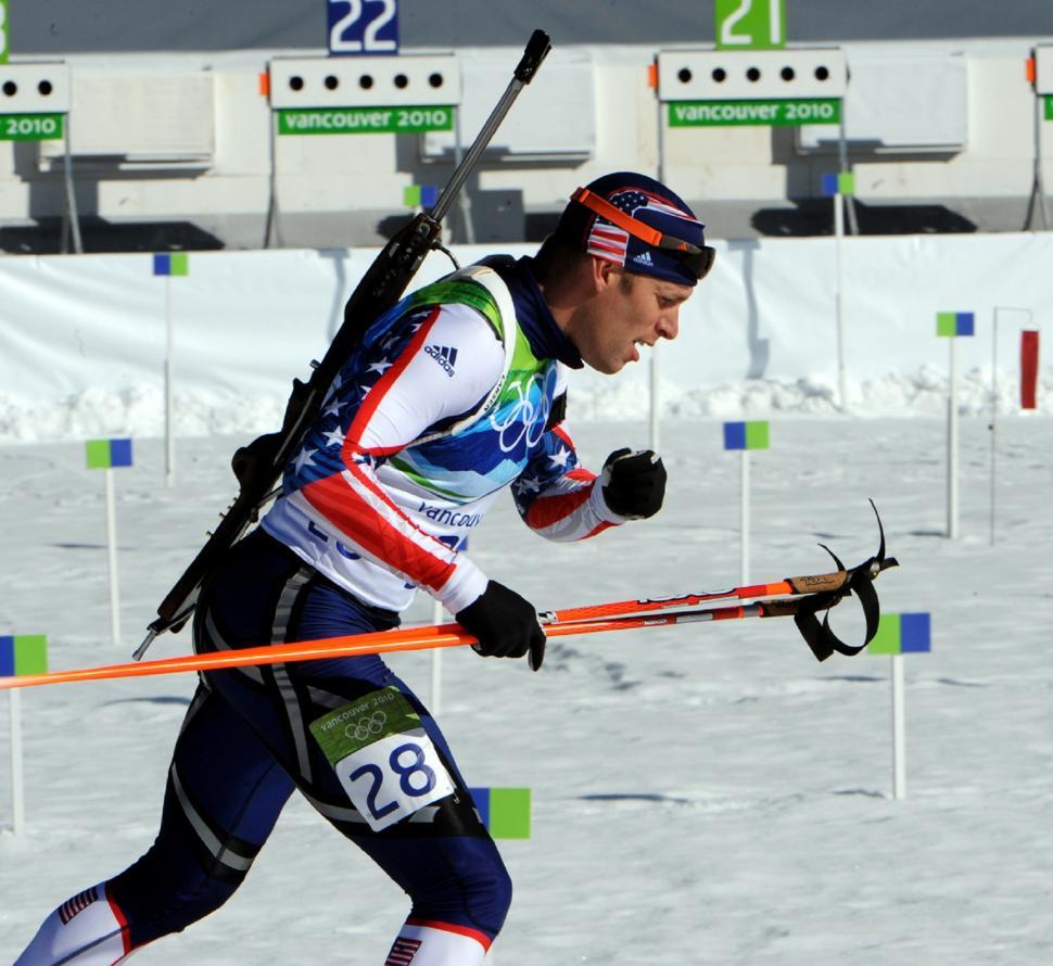 Free Image of Man Skiing in Snow With Poles 