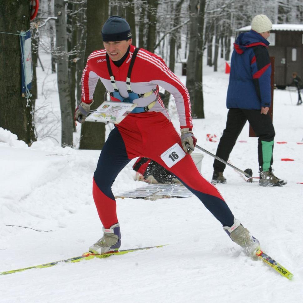 Free Image of Man Skiing Down Snow Covered Slope 