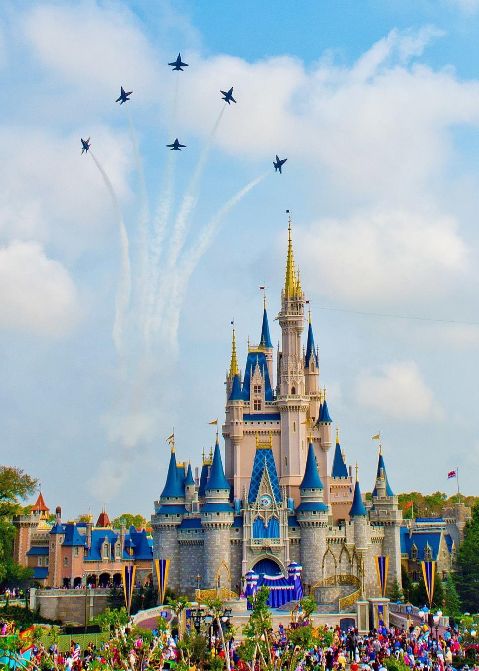 Free Image of Group of People Standing in Front of Castle 