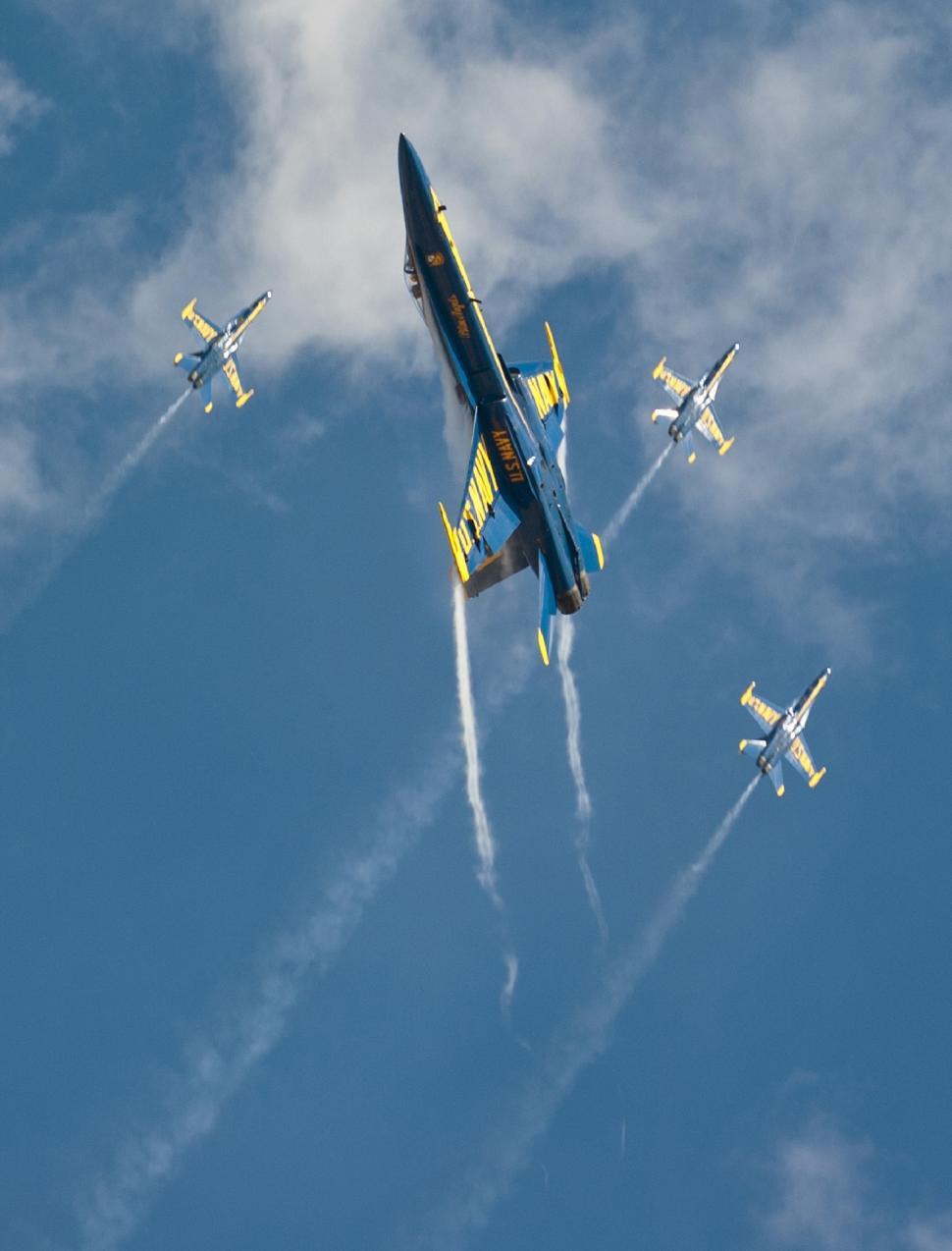 Free Image of Fighter Jets Flying Through Blue Sky 