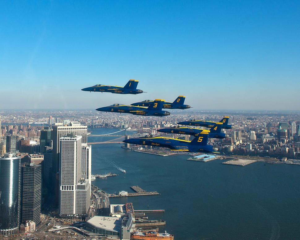 Free Image of Fighter Jets Flying Over City 