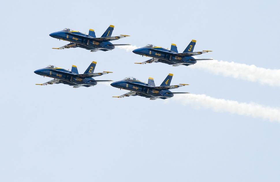 Free Image of Fighter Jets Flying Through Blue Sky 