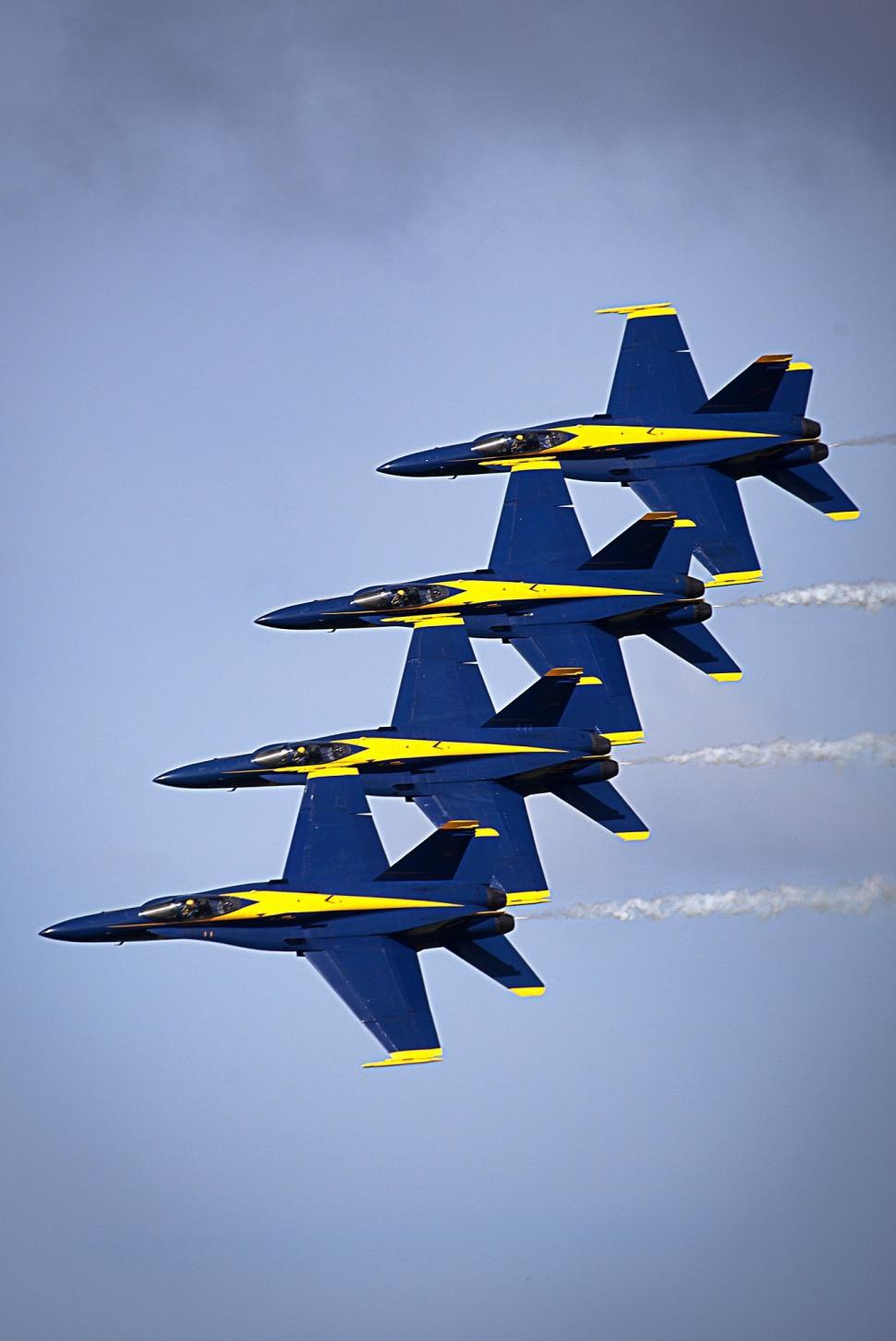 Free Image of Fighter Jets Flying Through Blue Sky 
