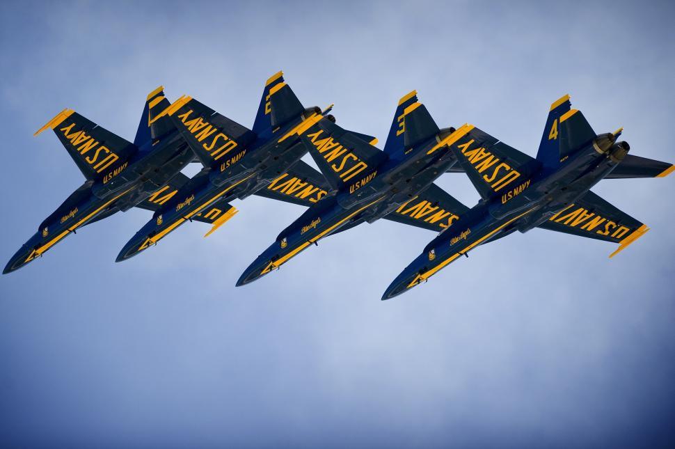 Free Image of Fighter Jets Flying Through Blue Sky 