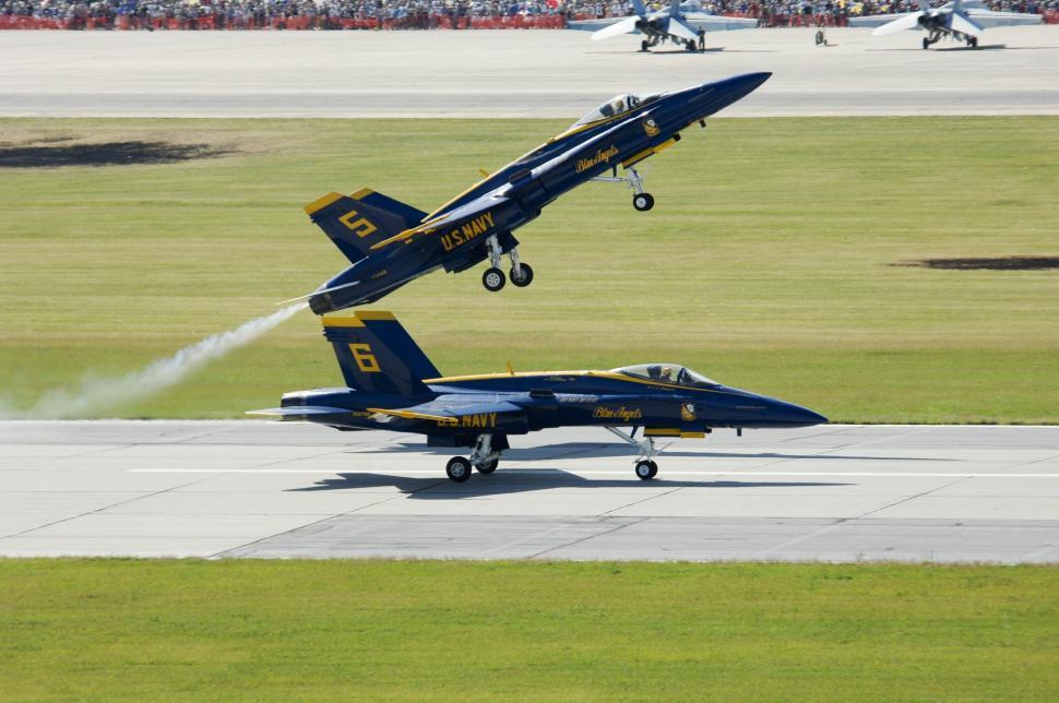 Free Image of Jets Flying Alongside Each Other on Runway 