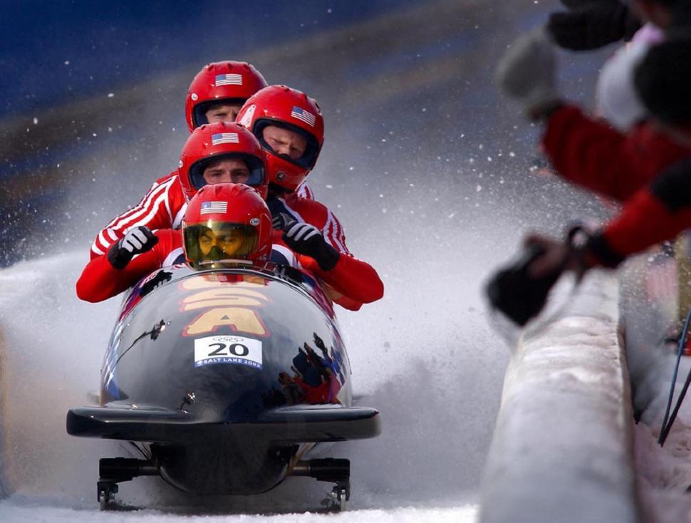 Free Image of Group of People Riding Down Snowy Slope 