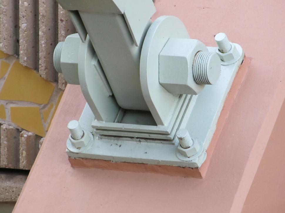 Free Image of Metal Object Close Up on Pink Wall 