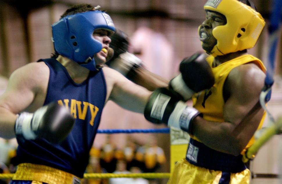 Free Image of Two Men Standing With Boxing Gloves 