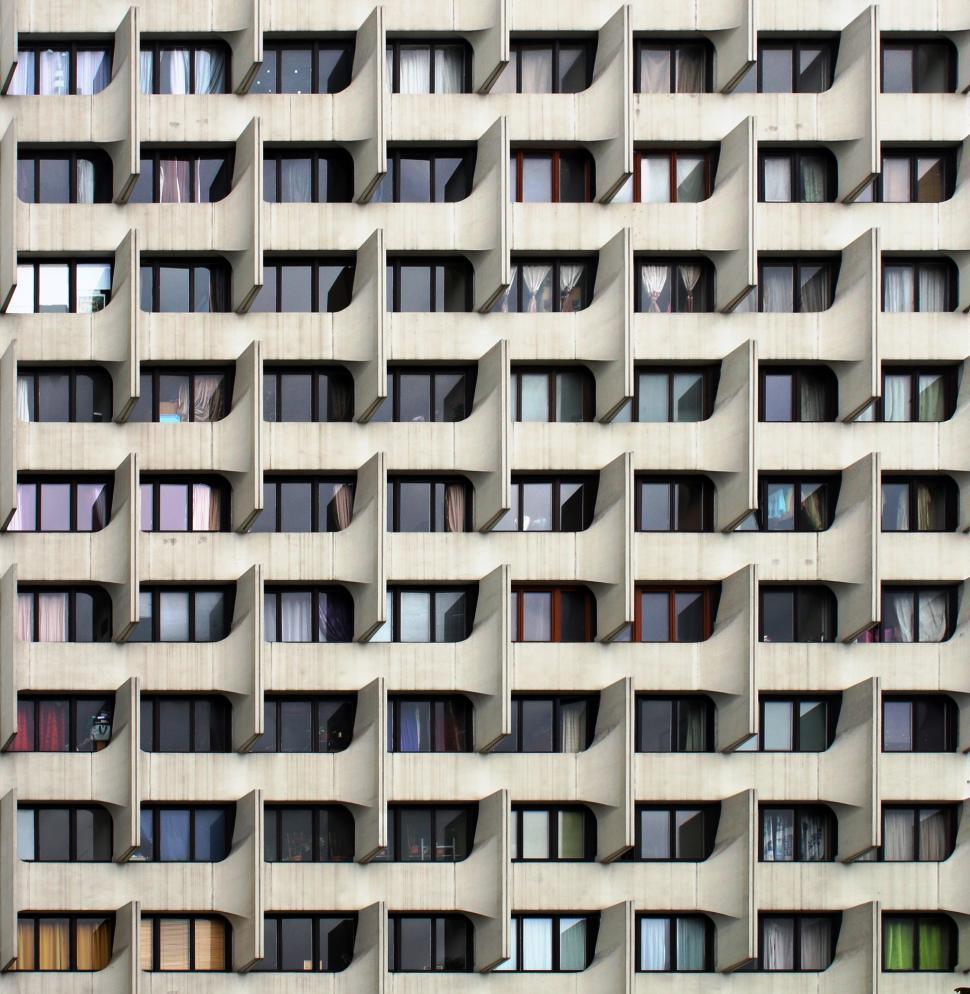 Free Image of Towering Building With Numerous Windows 