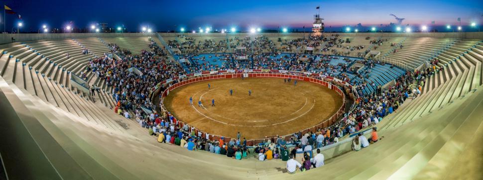 Free Image of Crowd of People Gathered Around Large Arena 