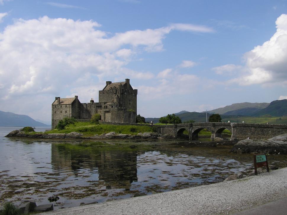 Free Image of Castle Atop Small Island by Water 