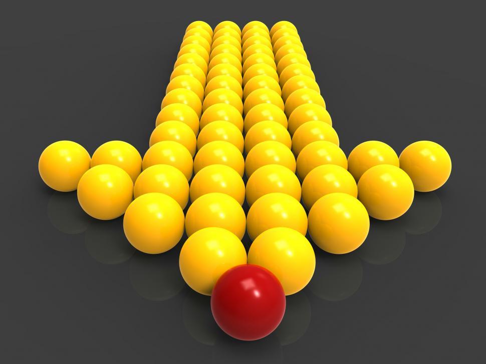 Free Image of Leading Metallic Balls In Arrow Showing Leadership 