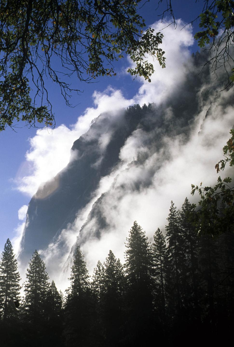 Free Image of snow blows off mountain 