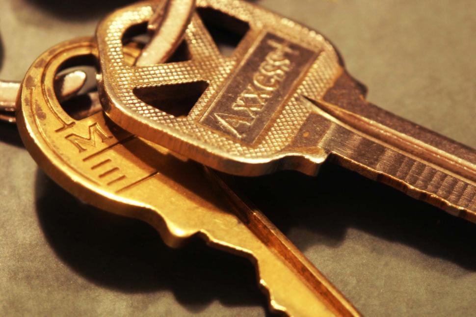 Free Image of A Bunch of Keys Laying on a Table 
