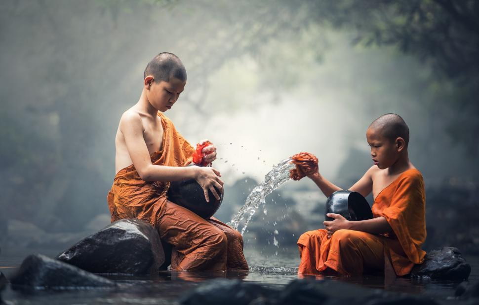 Free Image of Two Men Sitting Together 