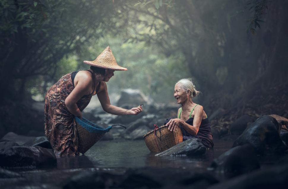 Free Image of Man and Woman Swimming in Water 