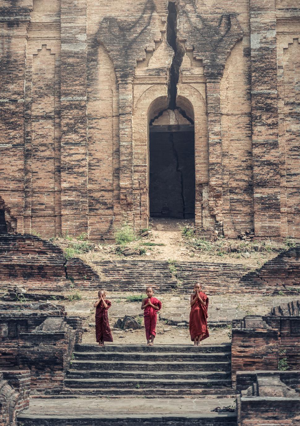 Free Image of Group of People Standing on Top of Stairs 