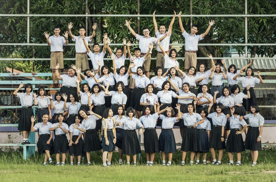 Free Image of Group of People Posing for a Picture 