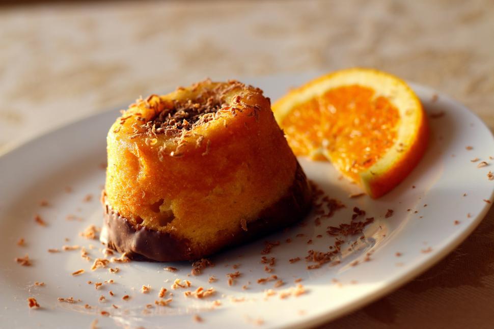 Free Image of White Plate With Cake and Orange 