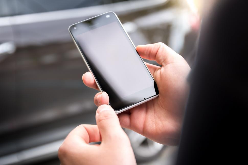 Free Image of Person Holding Cell Phone in Hand 