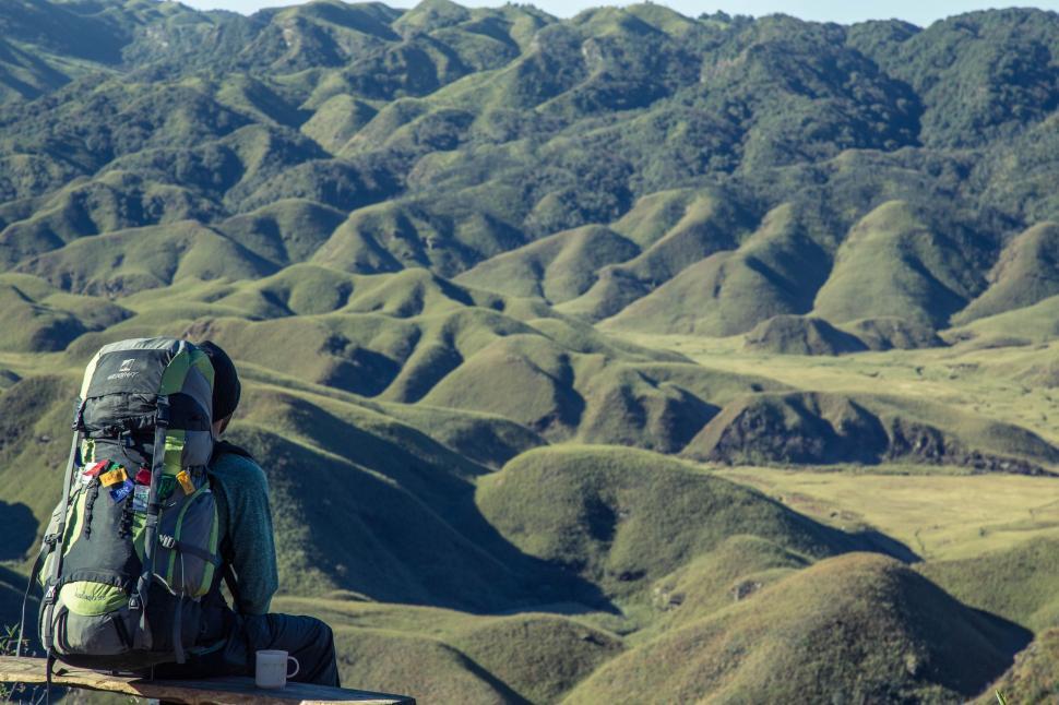 Free Image of Backpack on Top of Wooden Bench 
