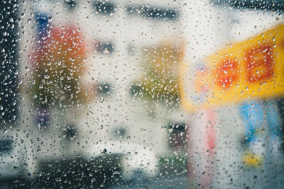 Free Image of Street View Through Rain Covered Window 