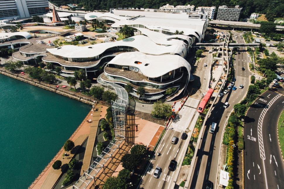Free Image of Aerial View of Large Building by Water 
