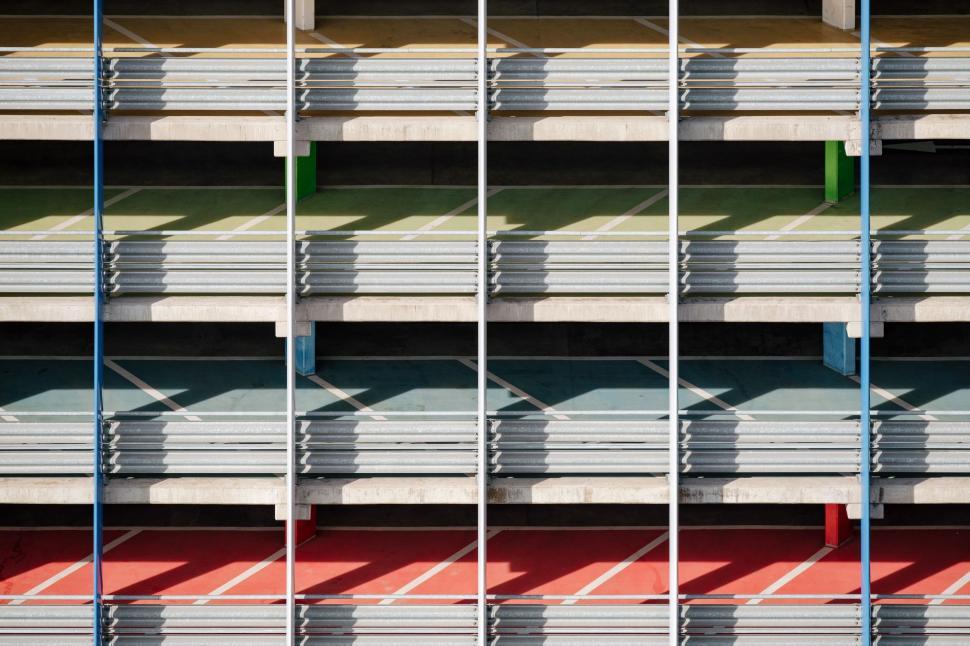 Free Image of Row of Empty Stadium Seats in Front of Building 