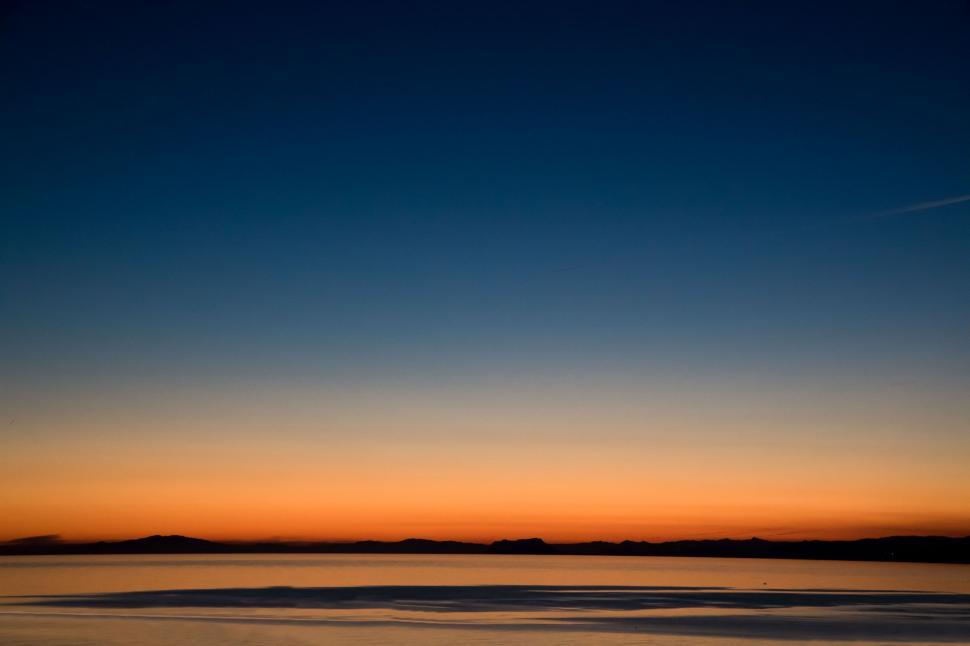 Free Image of Plane Flying in the Sky at Sunset 