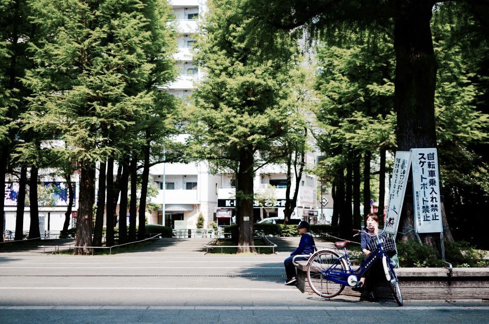 Free Image of Bike Parked in Front of Tall Building 
