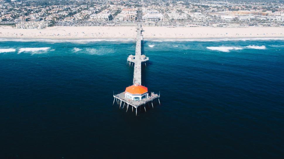 Free Image of Aerial View of Lighthouse in Middle of Ocean 