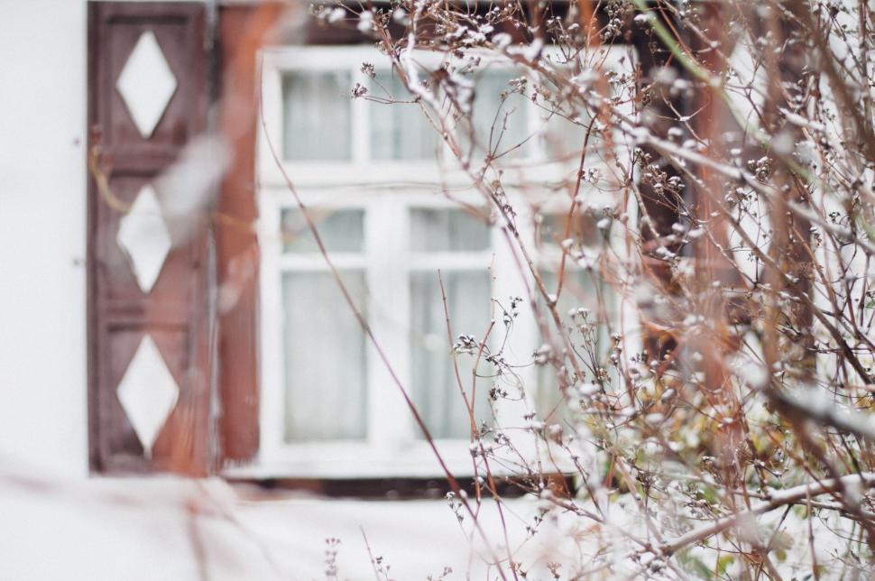 Free Image of House With Window Covered in Snow 