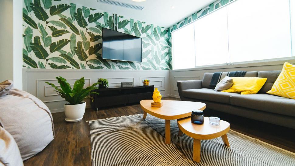Free Image of Cozy Living Room With Furniture and Flat Screen TV 