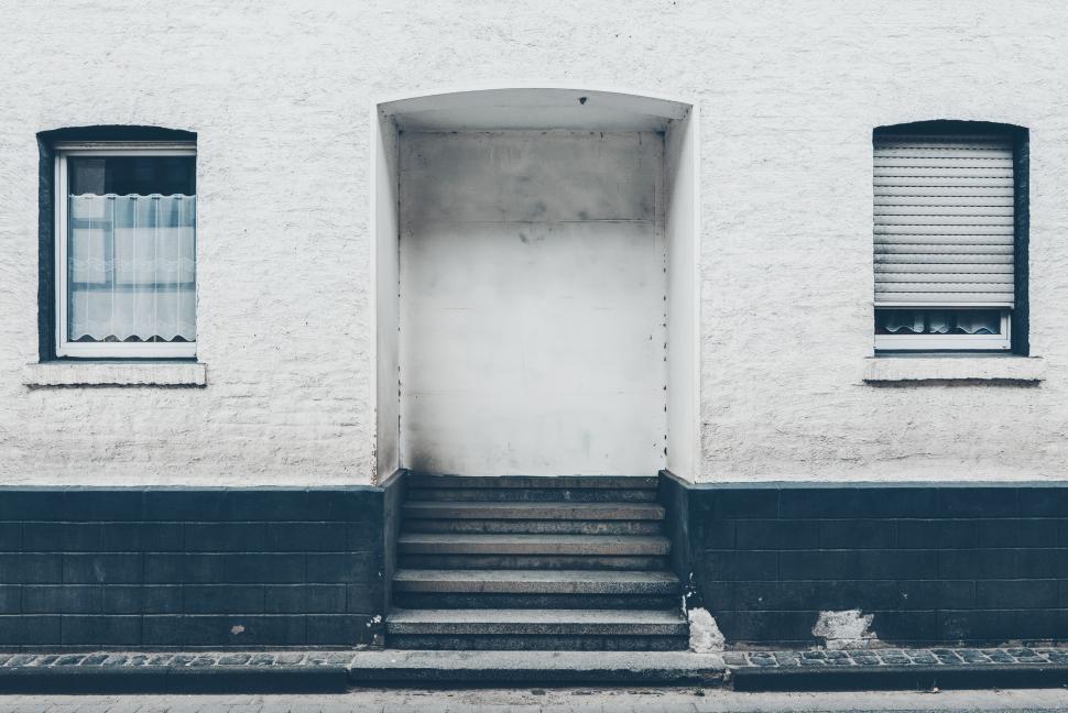 Free Image of Black and White Photo of a Door and Steps 