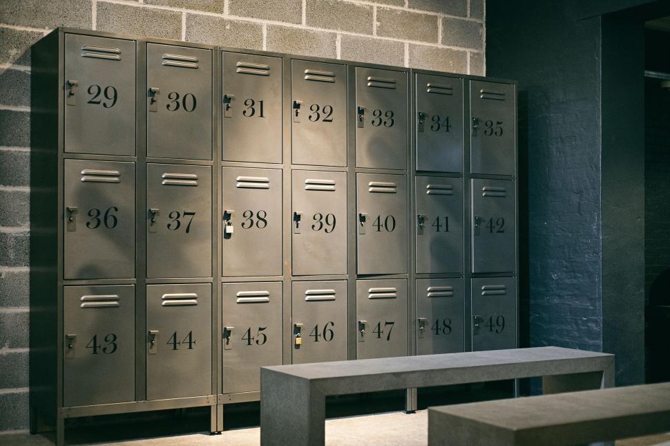 Free Image of Row of Mail Boxes Next to a Bench 