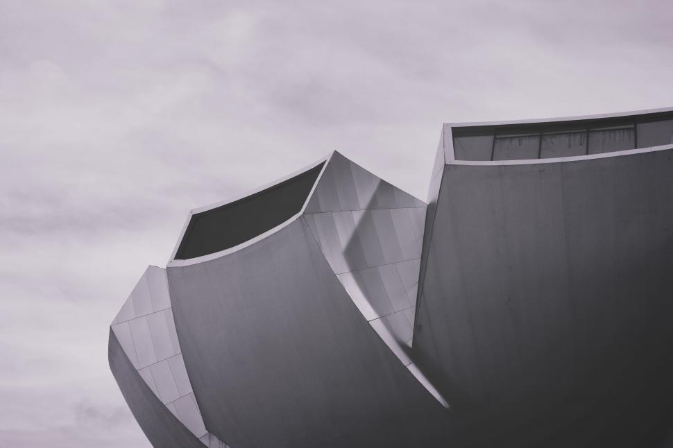 Free Image of Modern Curved Building With Glass Windows 