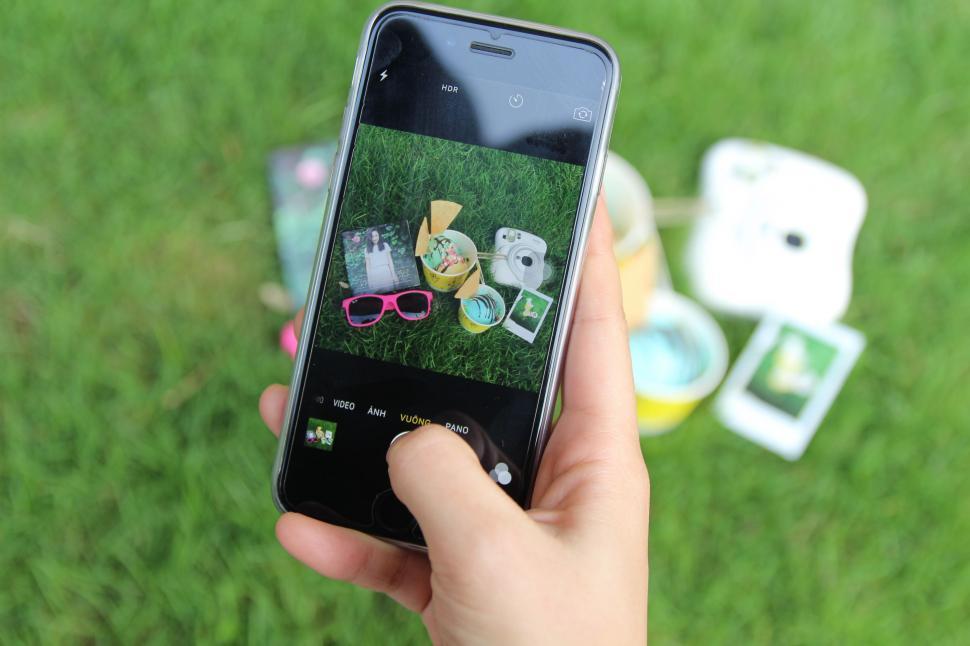 Free Image of Person Holding Smartphone in Hand 