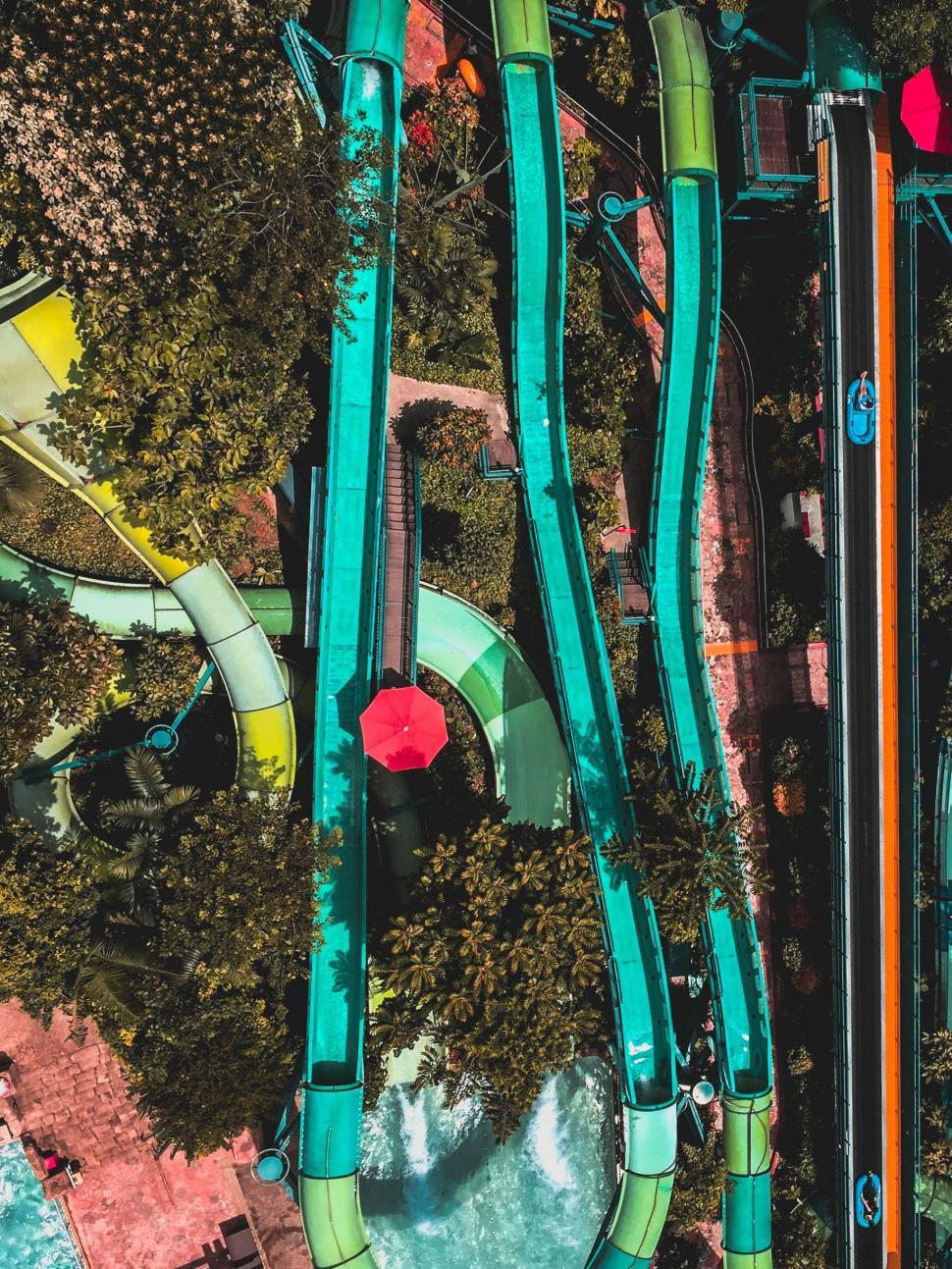 Free Image of Aerial View of a Water Park With Water Slide 