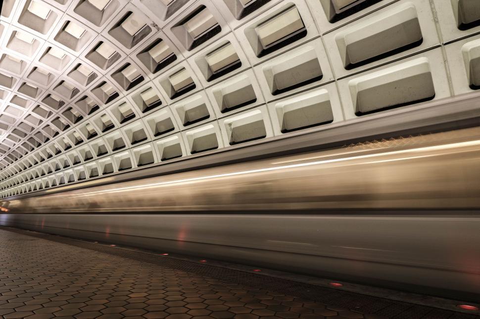 Free Image of Train Traveling Through Tunnel Beside Platform 