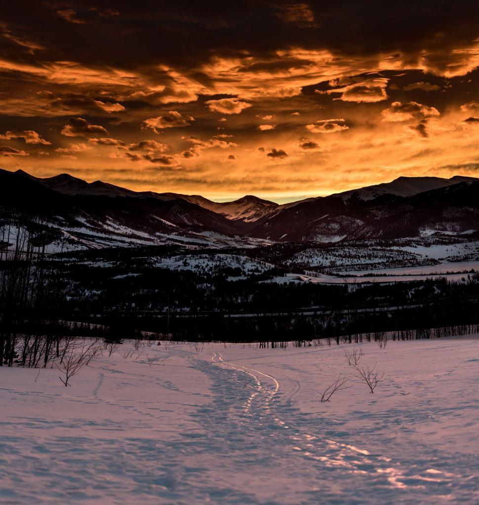 Free Image of Snow Covered Field With Sunset 