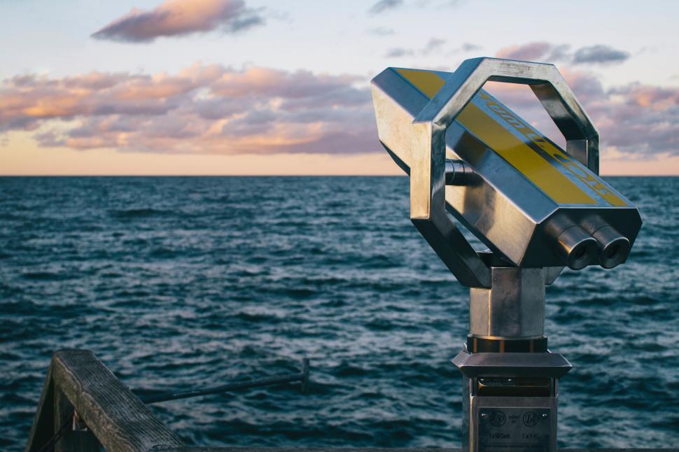 Free Image of Metal Object on Wooden Pier 