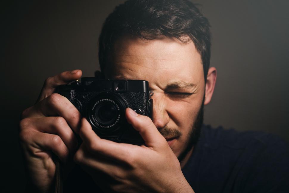 Free Image of Man Taking Selfie With Camera 