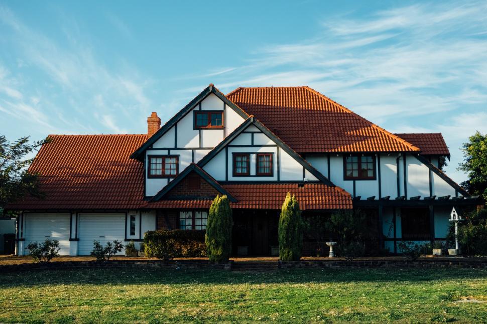 Free Image of Large White House With Red Roof 