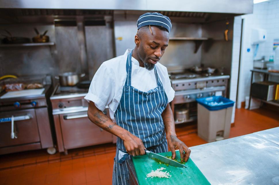 Free Image of Man Cooking in Kitchen 