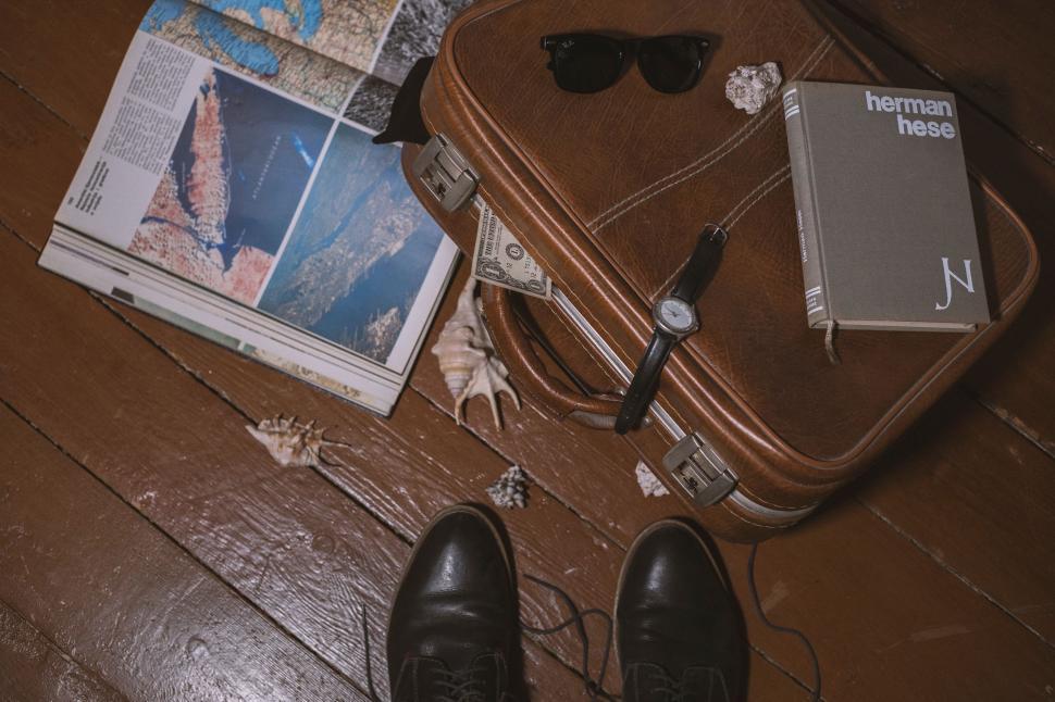 Free Image of Luggage on Wooden Floor 