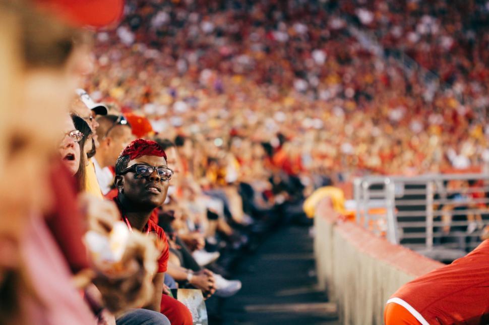 Free Image of Crowd of People Sitting in a Stadium 