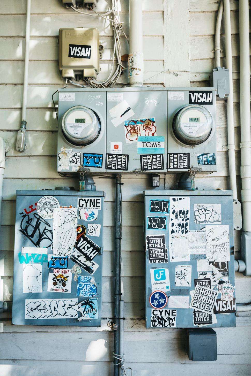Free Image of Two Parking Meters Standing Next to Each Other 