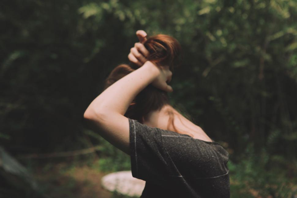 Free Image of Woman Holding Baseball Bat Over Her Shoulder 